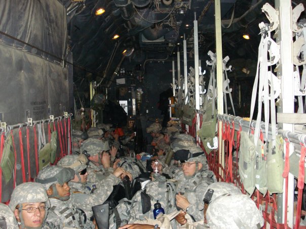 On the C-130 flying to Balad, Iraq.
