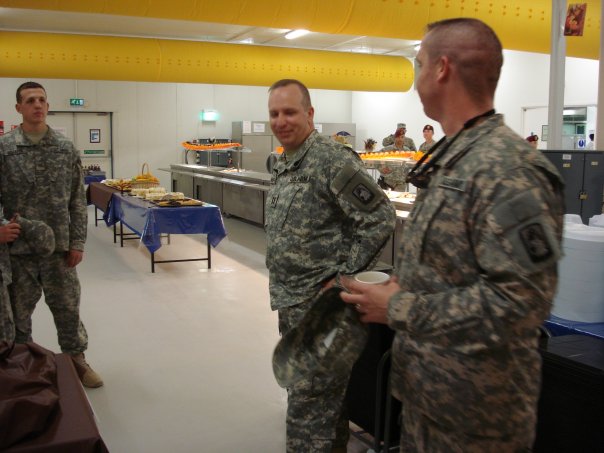 At the great Thanksgiving dinner at COB Basrah. I'm there getting ready to pray.