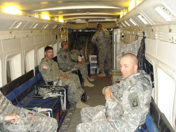 Inside the C-23 Sherpa (my assistant is on the left).